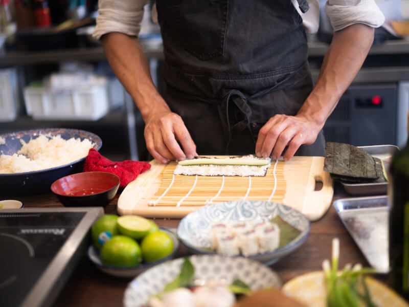 rolling sushi with bamboo mat